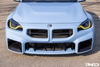 BMW M 50 Year Anniversary Heritage Roundel set on exterior of G87 M2, featuring commemorative badges on the car's body.