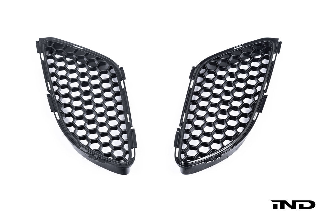 BMW E9X M3 hood vent mesh set for exterior, showcasing black metal grille inserts with mesh pattern on the hood.