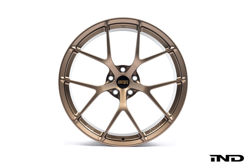 BBS 9J1 Taycan FI-R 21-inch wheel set with multi-spoke design, shown on a vehicle, showcasing sleek performance wheels.