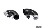 Eventuri F9X X5M X6M Pre-LCI Carbon Turbo Inlet Set for enhanced performance, featuring sleek carbon fiber components.