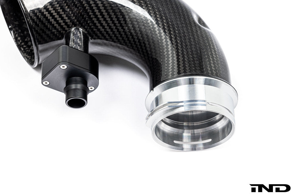 Eventuri F9X X5M/X6M Pre-LCI carbon turbo inlet set showing sleek black carbon fiber with detailed inlet components.