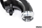 Eventuri F9X X5M/X6M Pre-LCI carbon turbo inlet set showing sleek black carbon fiber with detailed inlet components.
