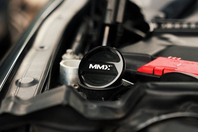 MMX Performance BMW F-Series billet washer fluid cap with sleek design, durable metal construction, and performance-focused style.