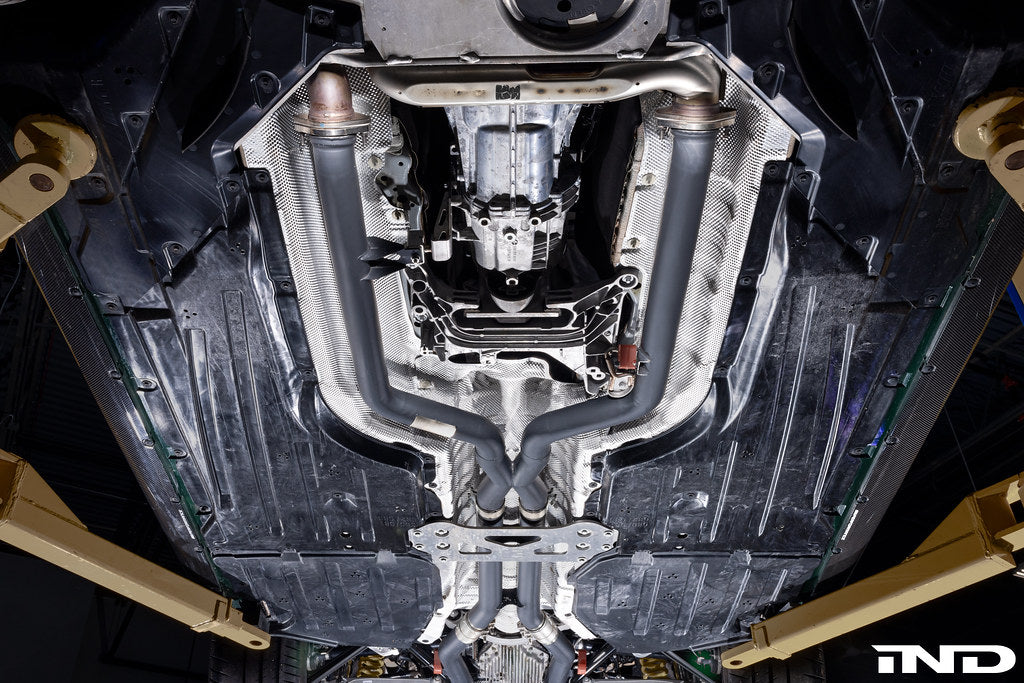 Eisenmann G8X M3/M4 exhaust center pipe set, performance car exhaust components, shown in close-up detail.