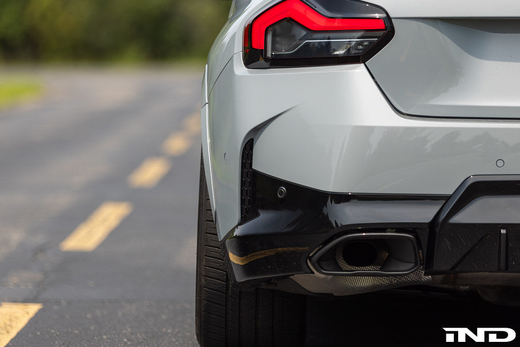 Exterior image of IND x Acexxon G42 2-Series M-Sport Reflector Cosmetic Package on a vehicle, showcasing sleek reflector design.