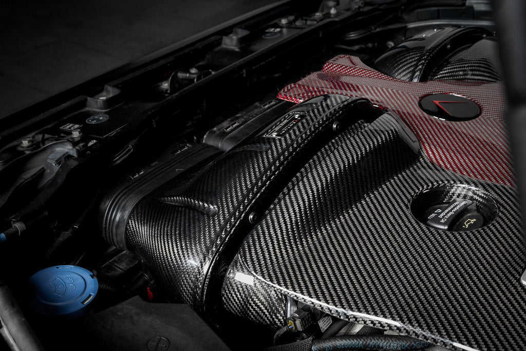 Eventuri Mercedes W463A G63 AMG black carbon intake system showing polished carbon fiber components and performance air filters.