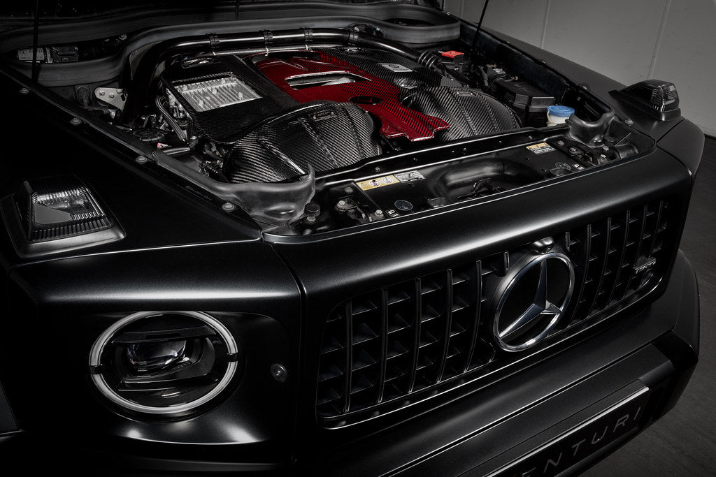 Eventuri black carbon intake system for Mercedes W463A G63 AMG, showcasing performance air intake with sleek carbon fiber details.