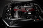 Eventuri black carbon intake system installed in a Mercedes W463A G63 AMG, showcasing high-performance engine air intake.