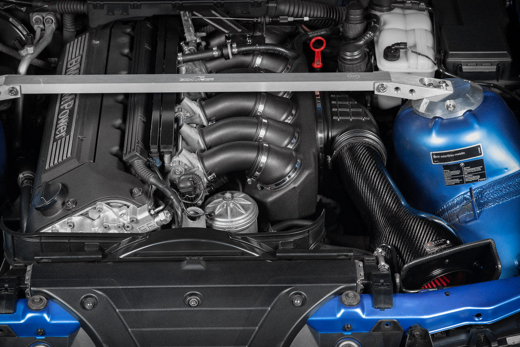 Eventuri BMW E36 M3 Euro Spec black carbon intake system, showcasing the sleek, high-performance engine upgrade.