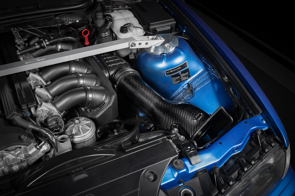 Eventuri black carbon intake system for BMW E36 M3 Euro Spec, performance engine upgrade, detailed view of the carbon components