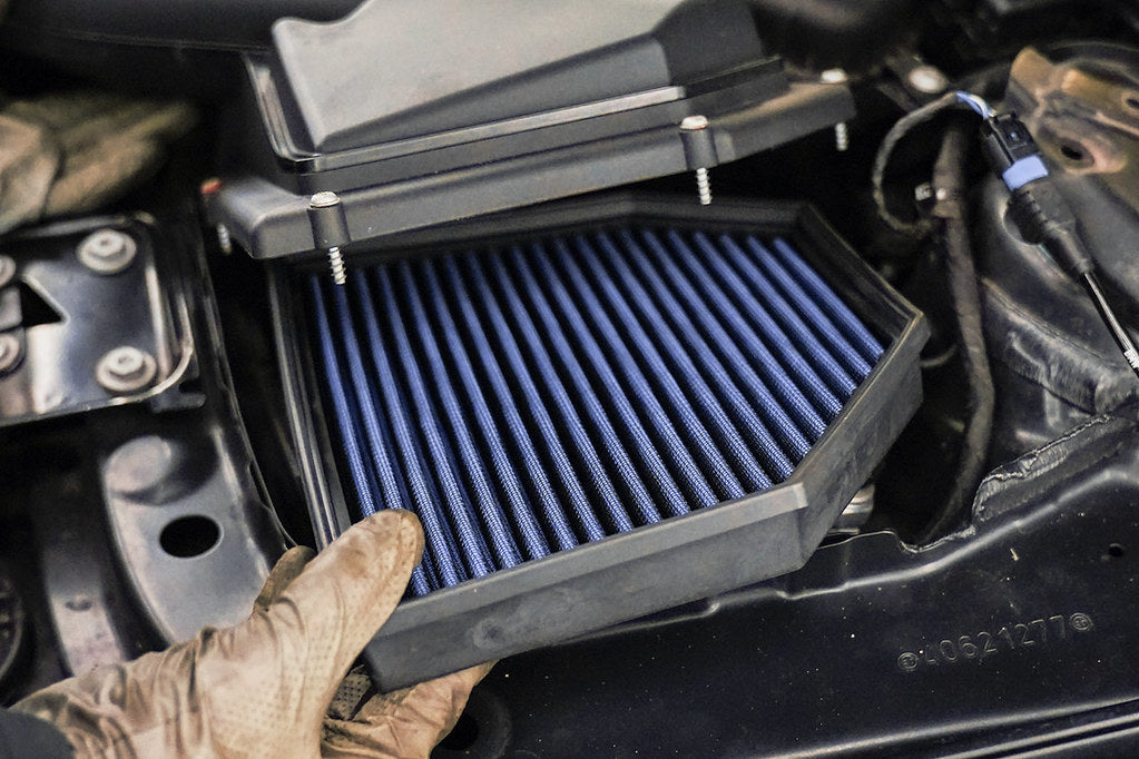 MMX Performance cotton panel air filter for F8X S55 and F1X S63 models, showing the textured filter material and black frame.