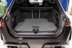 BMW G99 M5 Touring reversible cargo liner with carpet and rubber trunk mat, interior vehicle protection, OEM trunk mat.