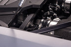 Eventuri Lamborghini Huracan EVO / STO black carbon intake system installed, showcasing sleek performance air intake design.