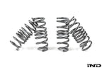 MMX Performance G90 G99 M5 xDrive suspension lowering spring set installed on vehicle, showcasing upgraded suspension components.