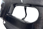 Karbonius E46 M3 carbon front bumper cover, exterior car part with sleek black finish and aerodynamic design.