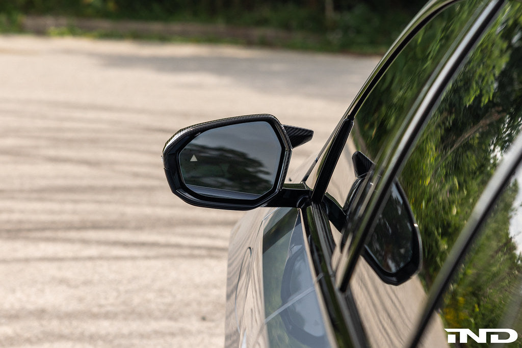 TREVORA G90 M5 and G60 i5 M60 carbon mirror covers for exterior, showcasing sleek, lightweight black carbon fiber finish.