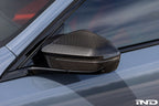 TREVORA G90 M5 / G60 i5 M60 carbon mirror cover set for exterior car mirrors, showing close-up of sleek, black carbon finish.