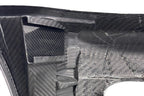 Karbonius E46 M3 carbon fiber front bumper cover for exterior styling, showcasing its sleek carbon finish and aerodynamic design.