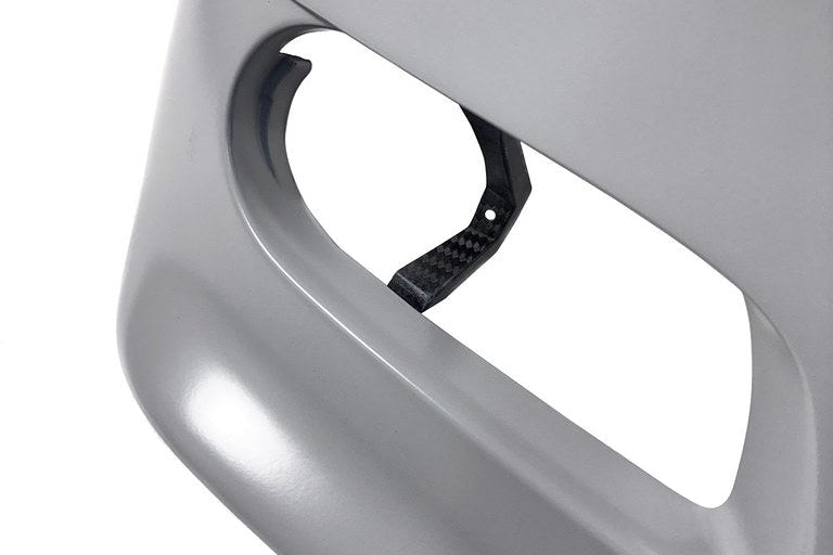 Karbonius E46 M3 carbon front bumper cover for exterior enhancement, showcasing the sleek, lightweight carbon fiber design.