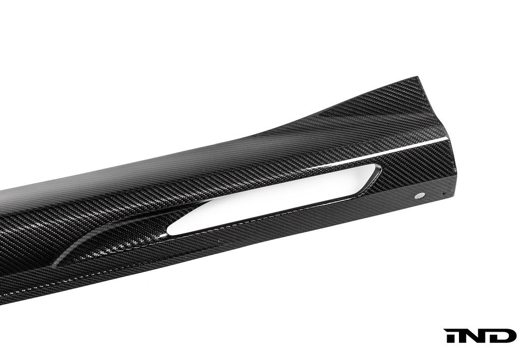3D Design G90 G99 M5 carbon fiber side skirts for BMW exterior, showcasing sleek, lightweight aerodynamic design.