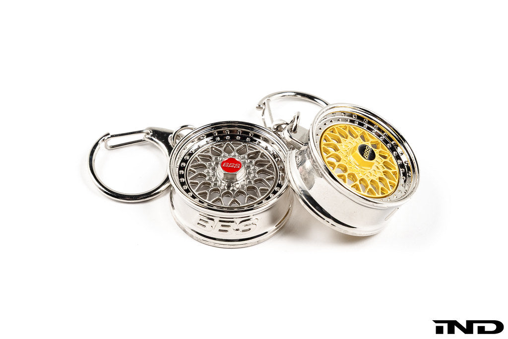BBS RS key ring with detailed miniature wheel design, featuring the iconic BBS logo on a metal keychain.