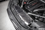 AutoTecknic dry carbon fiber cooling shroud for BMW F95 X5M, F96 X6M, and G09 XM exterior component with detailed carbon finish.