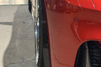 Alpha N F8X M3 M4 Carbon Corse Aeroblades exterior installed on vehicle, showcasing sleek carbon fiber aerodynamic enhancements.