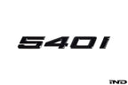 IND G30 540i painted trunk emblem for BMW 540i, exterior car badge with black finish and detailed logo on the trunk lid.