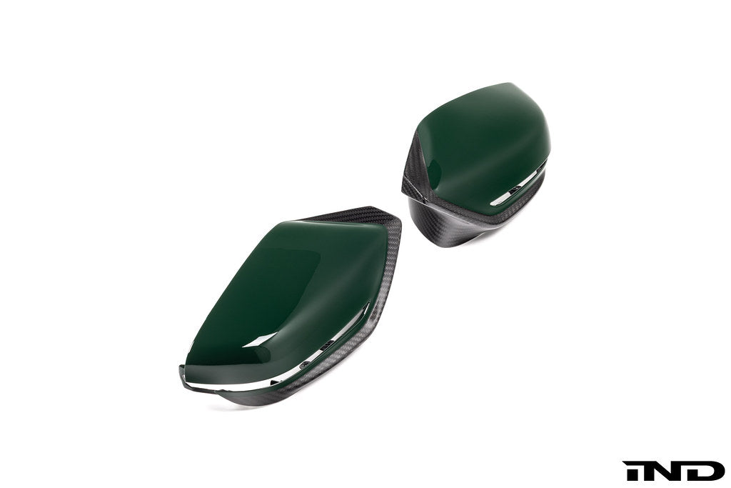 Alpha N G8X M2 M3 M4 carbon mirror cap set for exterior of BMW models, showcasing sleek black carbon fiber finish.