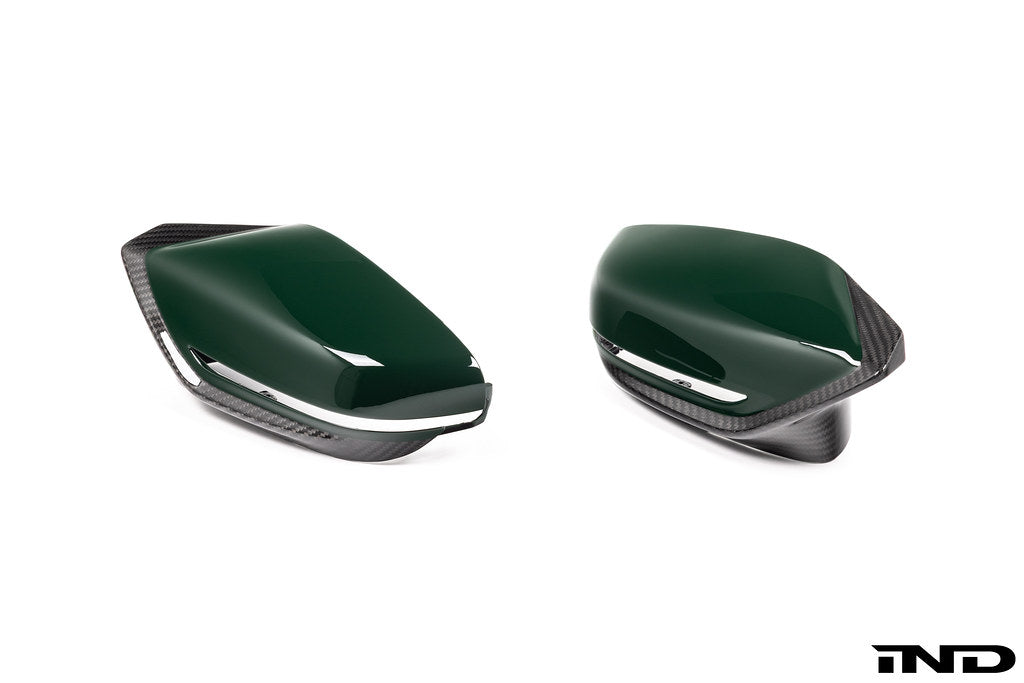 Alpha N G8X M2, M3, M4 carbon mirror cap set for exterior, sleek black finish on BMW models with aerodynamic design.