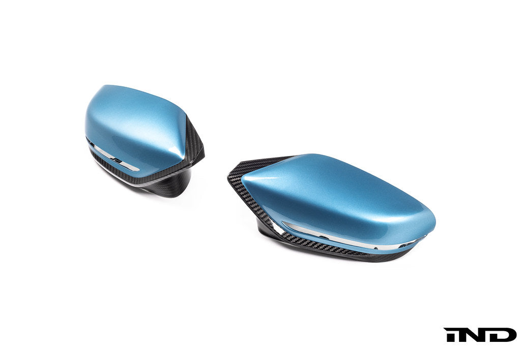 Alpha N G8X M2, M3, M4 carbon mirror cap set for exterior, showing sleek black carbon-fiber mirror covers on BMW models.