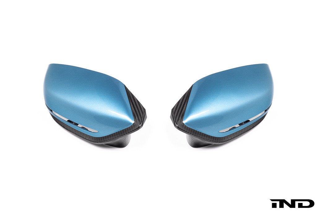 Alpha-N G8X M2/M3/M4 carbon mirror cap set for exterior, showing sleek black carbon fiber mirror covers on a vehicle.