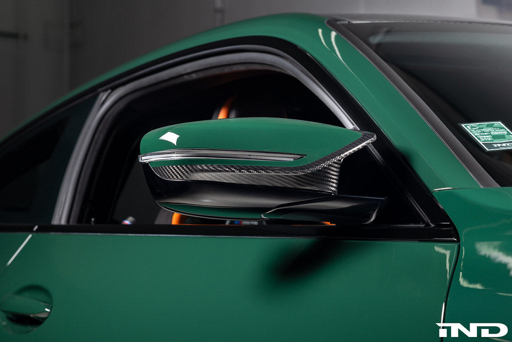 Alpha N G8X M2 M3 M4 carbon exterior mirror cap set showing sleek black finish on vehicle mirrors.