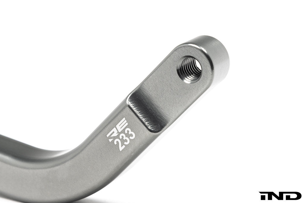 Rogue Engineering dual shear selector rod for performance vehicle transmission linkage, shown in black with metal fittings.