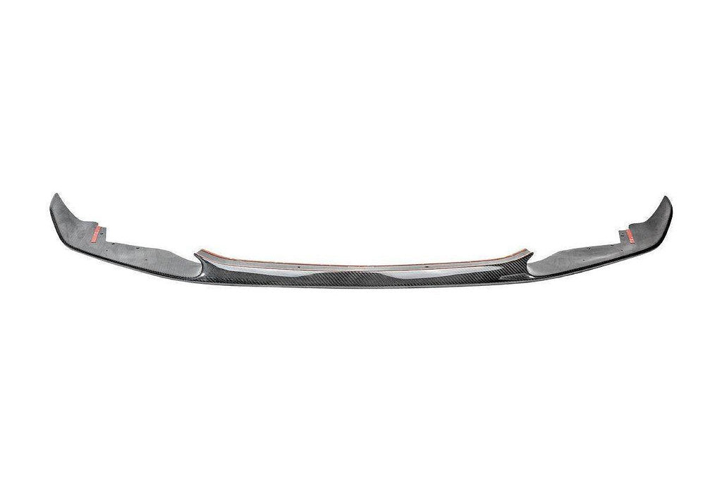 TREVORA BMW F87 M2 OG pre-preg carbon fiber front splitter installed on the exterior of the car.