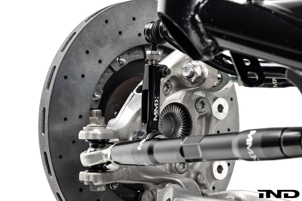 MMX Performance G8X M2 M3 M4 adjustable rear sway bar links for car suspension, showing the metal links with mounting hardware.