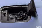 MMX Performance billet fuel cap installed on vehicle exterior, showcasing durable metal construction and sleek design.