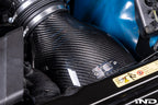 Eventuri E46 M3 hybrid carbon airbox system showcasing sleek carbon fiber construction and performance-enhancing design.