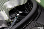 MMX Performance BMW billet coolant expansion cap showing polished metal finish and mounting details for performance cooling systems.