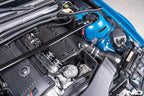 Eventuri E46 M3 hybrid carbon airbox system showcasing sleek carbon fiber construction and performance-enhancing design.