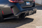 TREVORA G90 G99 M5 carbon fiber rear diffuser for exterior car modification, featuring aerodynamic design on a sleek vehicle.