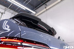 TREVORA G99 M5 carbon fiber rear roof spoiler exterior for enhanced aerodynamics on a vehicle.