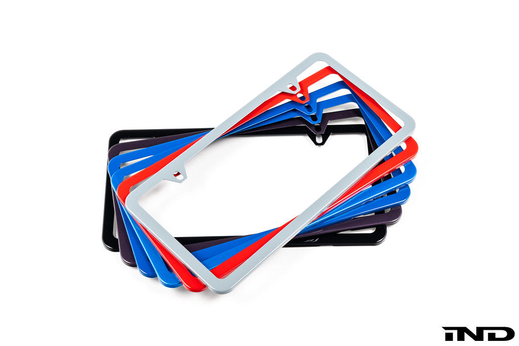 IND Painted License Plate Frame for exterior use, featuring a sleek design and vibrant paint finish, suitable for vehicle customization.