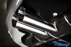 Eisenmann E46 M3 performance exhaust system with polished tips and dual exhaust outlets on a car.