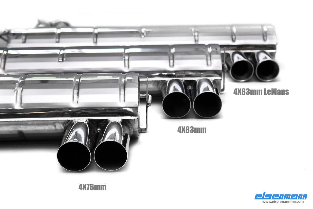 Eisenmann E46 M3 performance exhaust system with polished dual exhaust tips on a car engine bay.