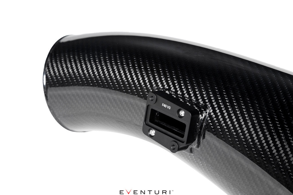 Eventuri black carbon intake system for BMW F7X M135 M235 and X1 X2 M35i B48, performance air intake on white background