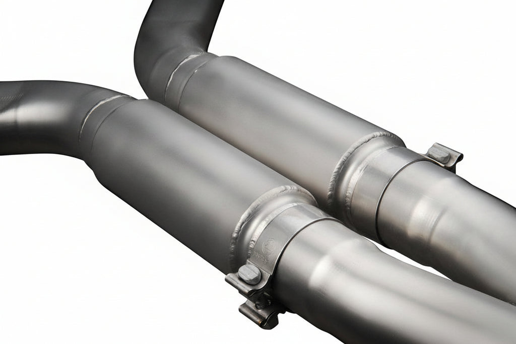 Eisenmann F1X M5 / M6 F06 M6 exhaust center pipe set installed on vehicle, showcasing polished metal finish and exhaust connections.