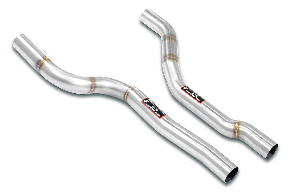 Supersprint BMW G8X M3 M4 dual front exhaust pipe kit installed on vehicle, showcasing polished metal pipes and connection points
