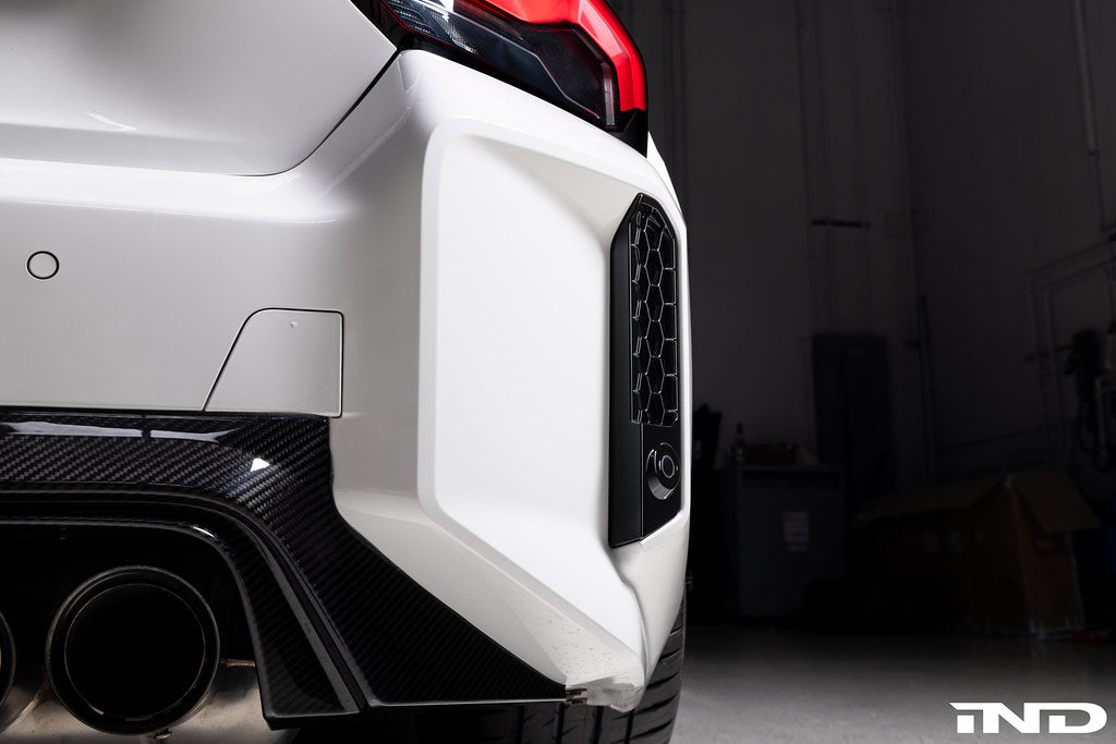 Acexxon G87 M2 Full Replacement Rear Reflector Insert Set with honeycomb design installed on an Alpine White BMW G87 M2