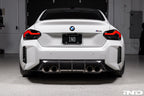 Acexxon G87 M2 Full Replacement Rear Reflector Insert Set featuring both honeycomb and horizontal designs installed on an Alpine White BMW G87 M2.